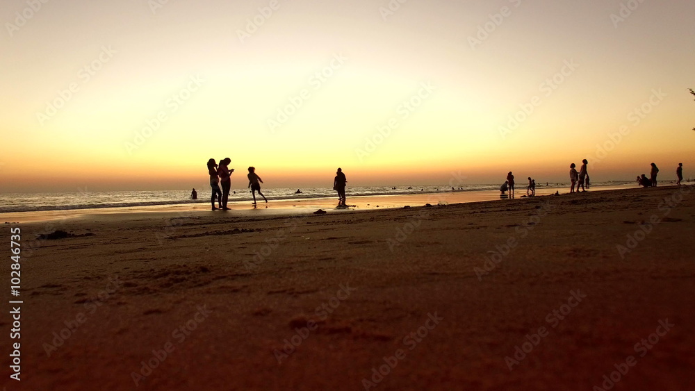 people on sea beac at dusky sky people on sea beac at dusky sky