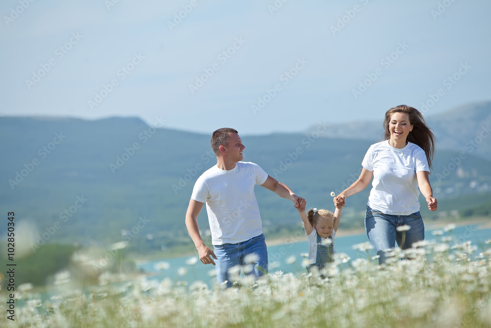 happy family in a camomile field happy family in a camomile field