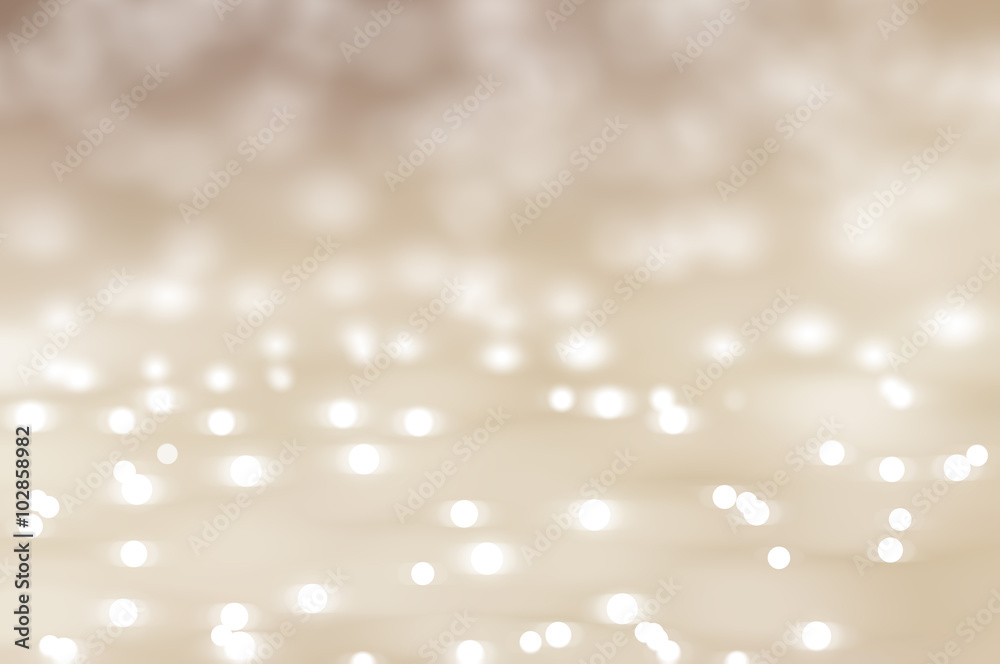 Bokeh light, shimmering blur spot lights on beige abstract Bokeh light, shimmering blur spot lights on beige abstract