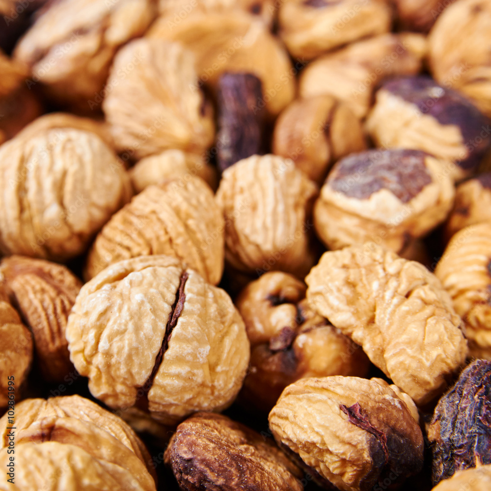 Dried peeled chestnut background Dried peeled chestnut background