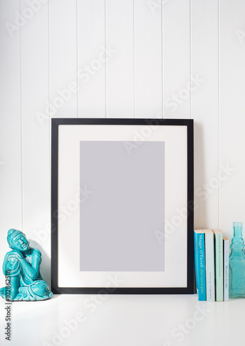 Black picture frame on desk