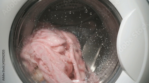 Internal view of washing machine drum during wash