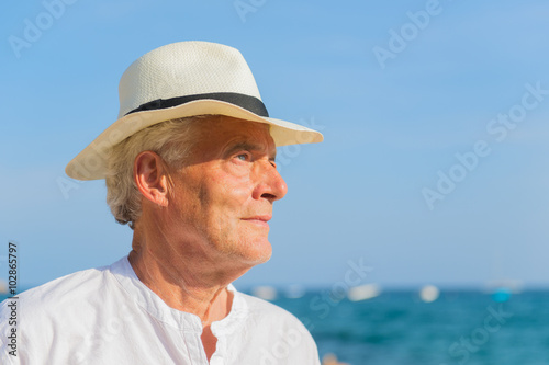 Senior man at the beach © Ivonne Wierink