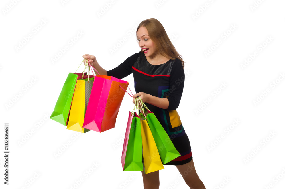 Woman with shopping bags isolated on white