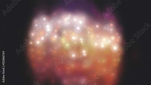 Bokeh light  shimmering blur spot lights on orange abstract back