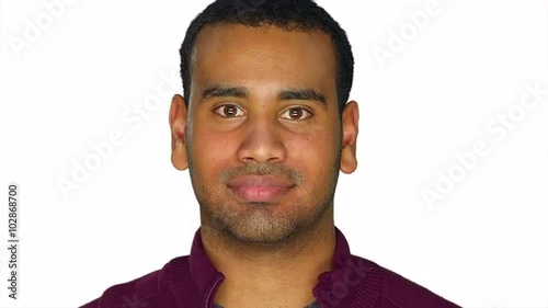 Young african american man making funny faces, on a white studio backgroundYoung african american man making funny faces, on a white studio background photo