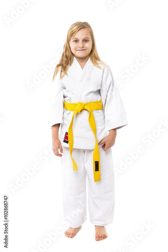 Full length portrait of a karate girl in kimono