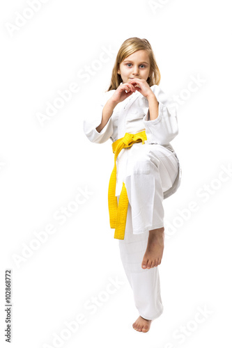 Portrait of little girl training ashihara martial art