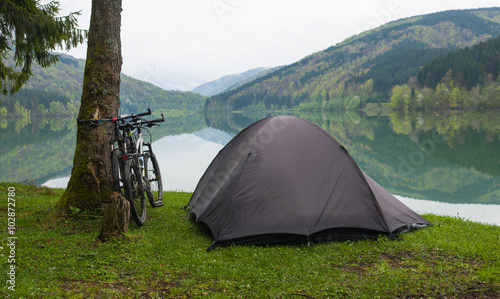 Camping by a lake. Spring cycling trip in Transcarpathia