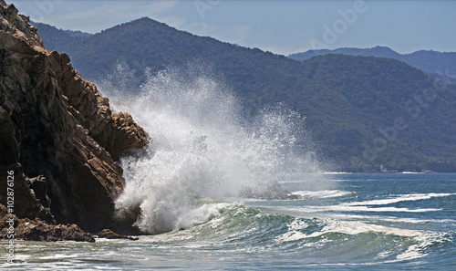 Waves crashing on a rocky coast. © geraldmarella