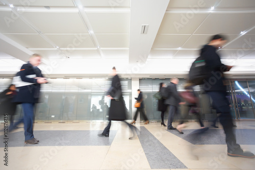 London businessman train tube station in rush hour