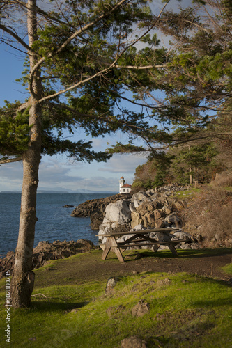 Line Kiln Lighthouse. Located on San Juan Island, in Washington state, It guides ships through the Haro Straits and is part of Lime Kiln Point State Park. It overlooks Dead Mans Bay. photo