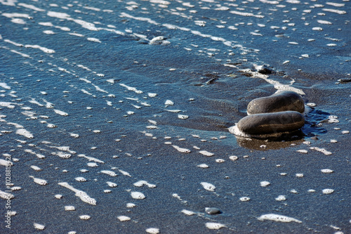 wet pebbles on the sea beach
