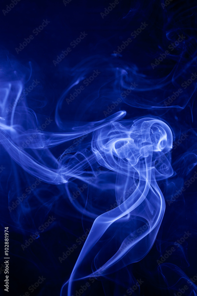 Blue smoke on a black background. Blue smoke on a black background.