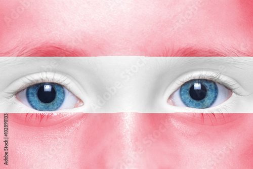 child's face with hungarian flag