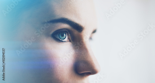 Fotografia Closeup of woman eye with visual effects, isolated on white background