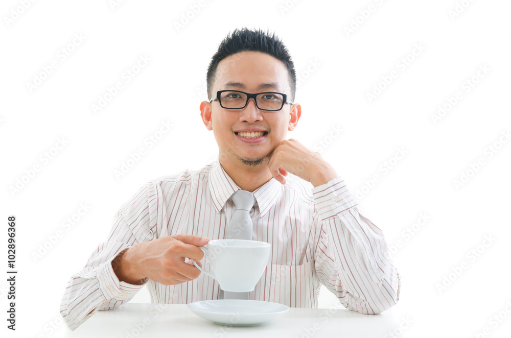 asian business male drinking coffee asian business male drinking coffee