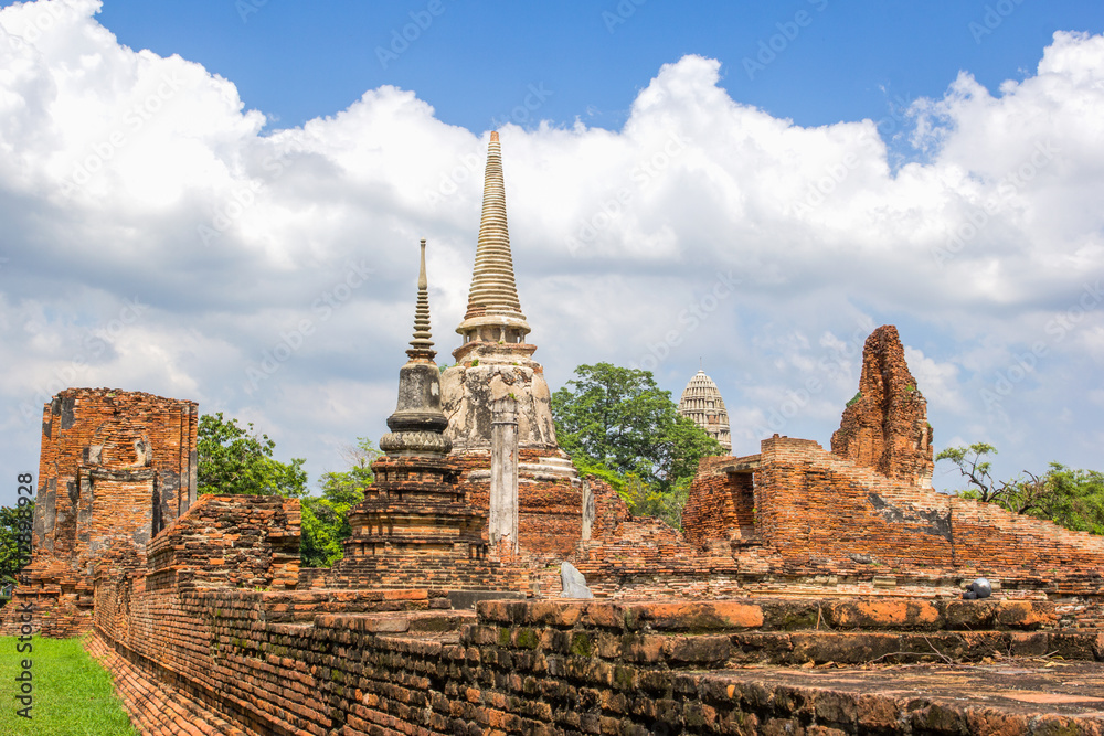 Tourist travel to visit ancient pagoda at Wat Mahathat temple, Ayutthaya, Thailand Tourist travel to visit ancient pagoda at Wat Mahathat temple, Ayutthaya, Thailand