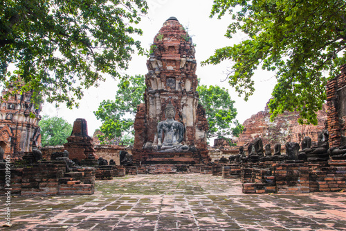 Tourist travel to visit ancient pagoda at Wat Mahathat temple, Ayutthaya, Thailand © kannapon