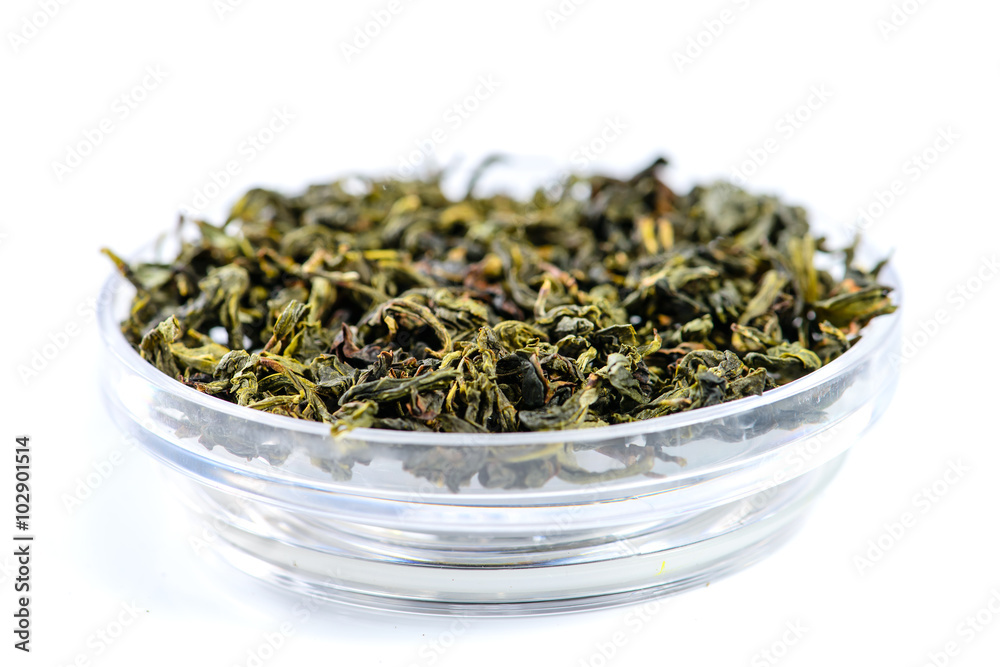 closeup of Bao Zhong Oolong Tea isolated on white background