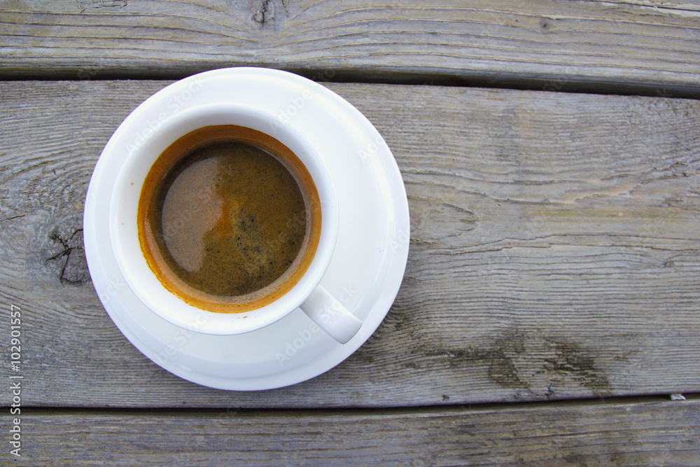 Cup of Americano on wooden table. Cup of Americano on wooden table.