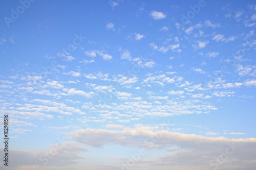 Fantastic soft white clouds against blue sky © kannapon