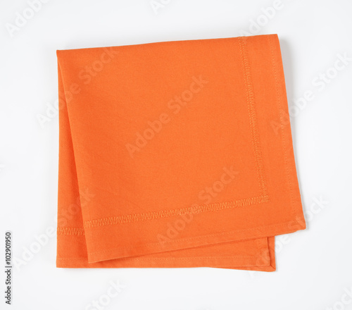 Folded orange napkin
