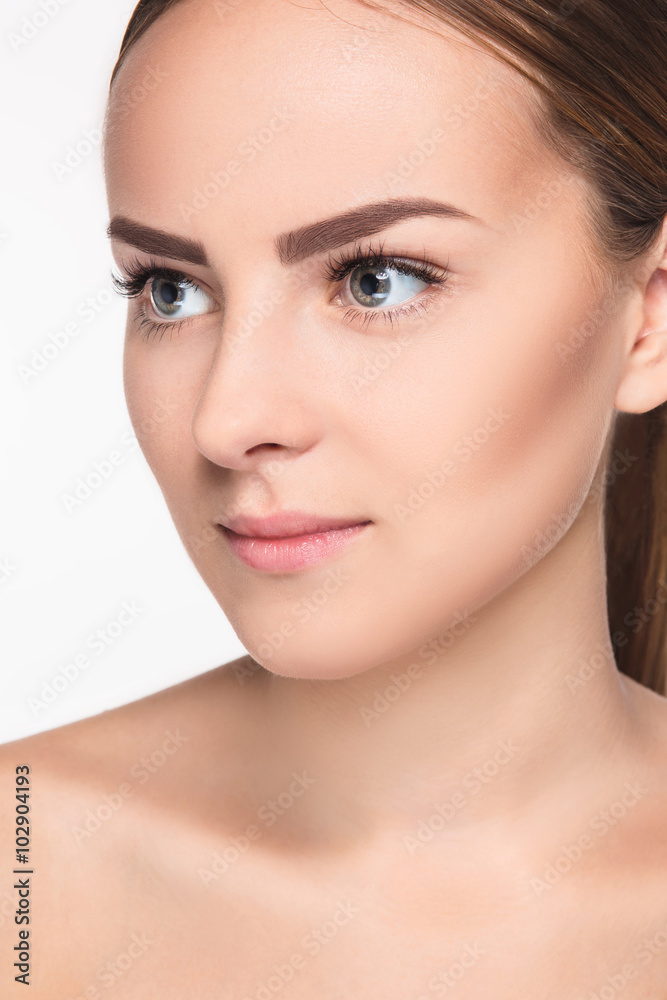 The beautiful face of young woman with cleanf fresh skin 