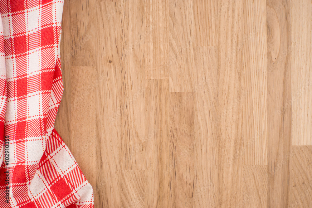 the checkered tablecloth on wooden table the checkered tablecloth on wooden table