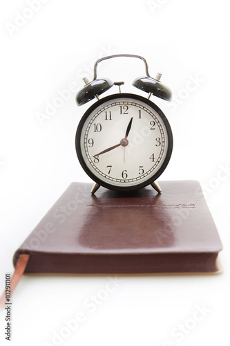 The clock on the notebook in retro style