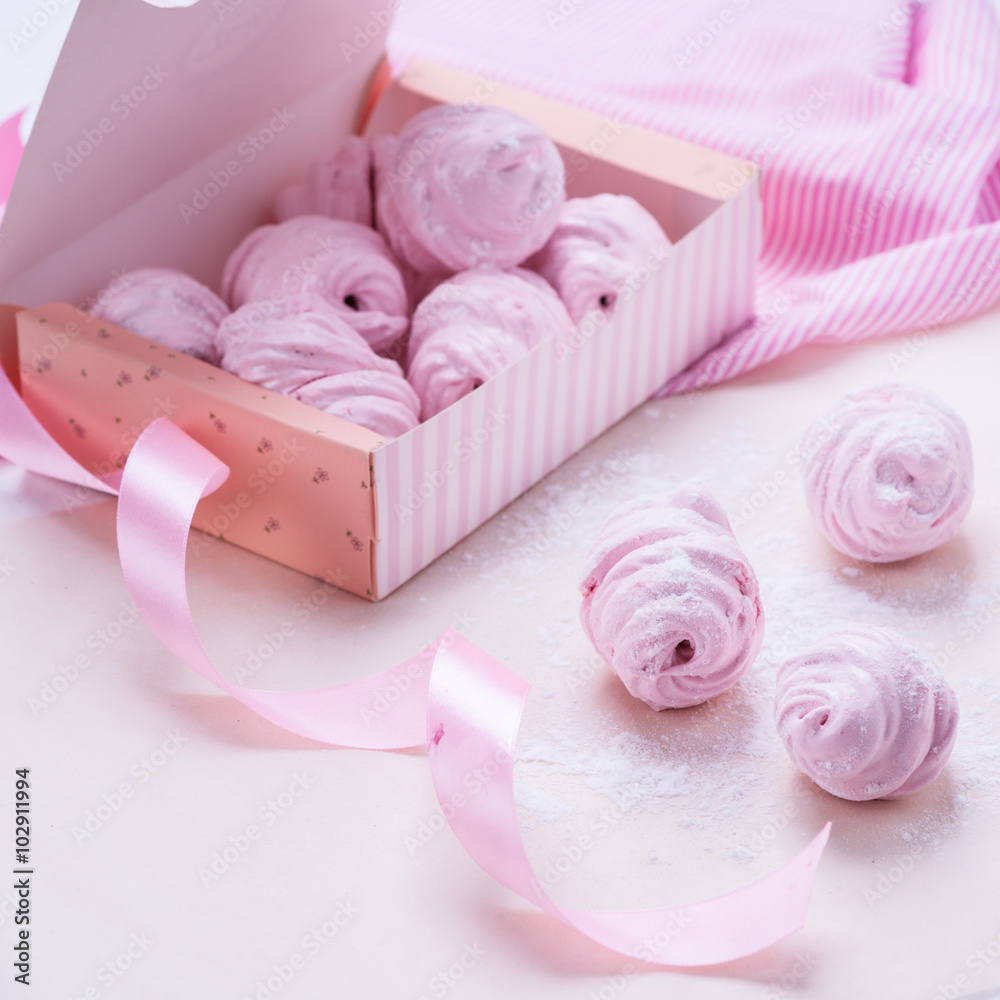 Berry marshmallow in a gift box on a pink background Berry marshmallow in a gift box on a pink background