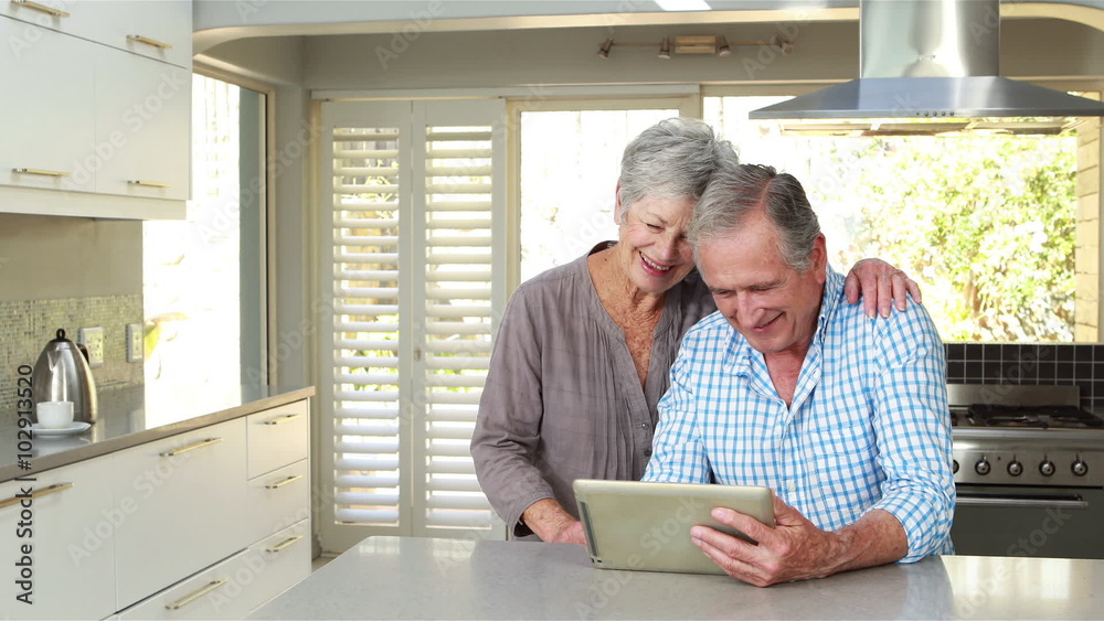 Senior couple using tablet pc Senior couple using tablet pc