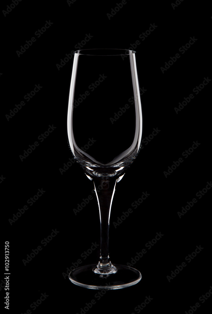 Empty  wine glass on black background studio shot