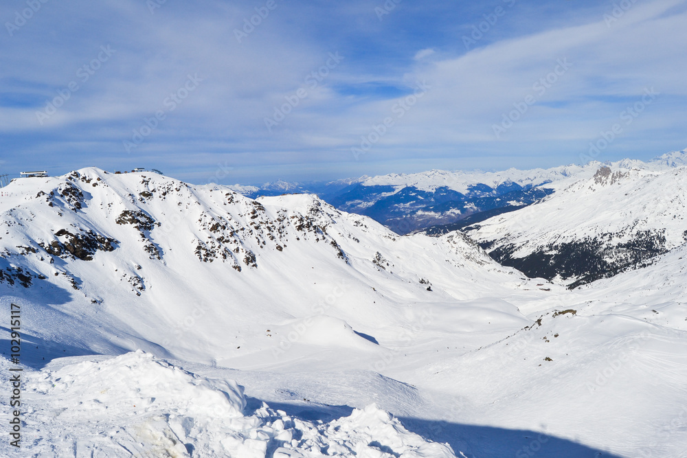 Winter landscape with snow covered mountains