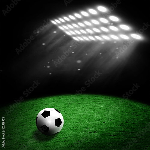 Soccer ball on the stadium lawn