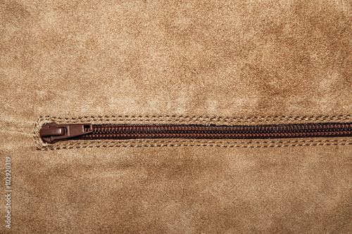 Photography Close up shammy leather texture with zipper