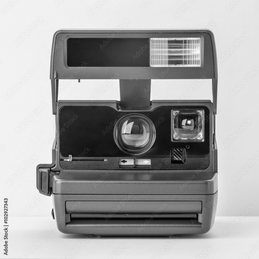 Close Up Instant Camera. Instant camera isolated on white background. Close Up Instant Camera. Instant camera isolated on white background.