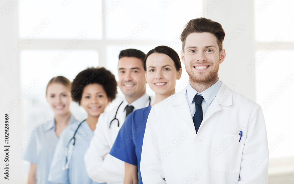 group of happy doctors at hospital