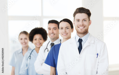 group of happy doctors at hospital © Syda Productions