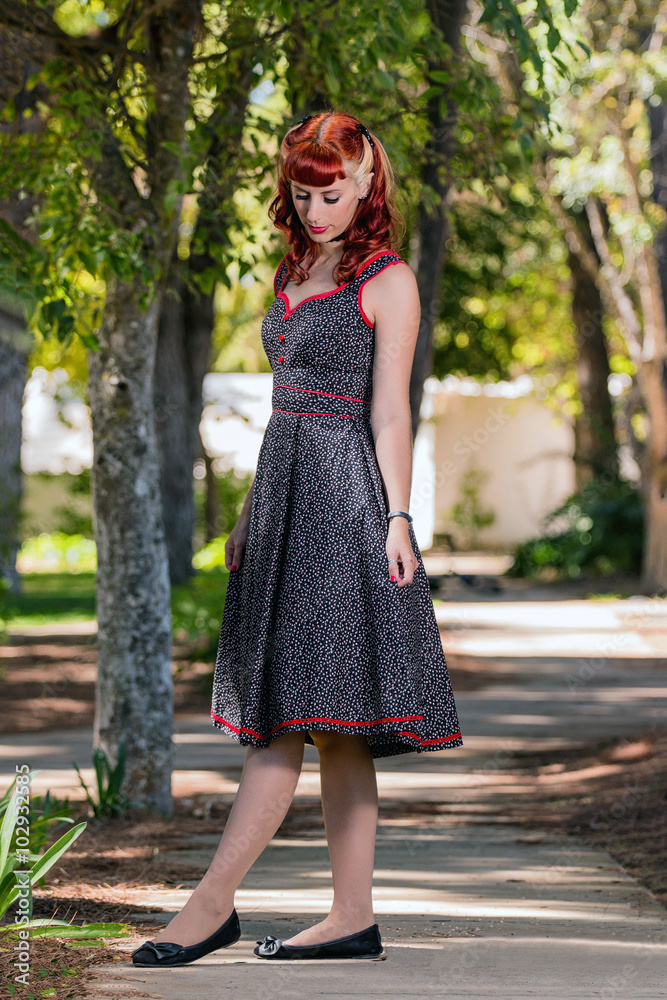 young woman with a simple spring dress posing on the park young woman with a simple spring dress posing on the park