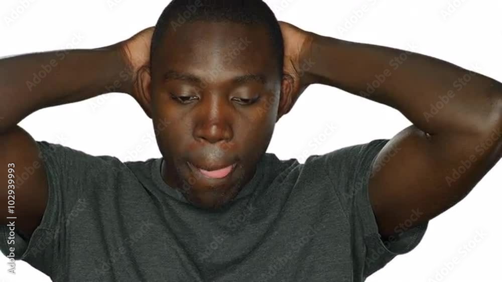 Stressed young man, on a white studio background Stressed young man, on a white studio background