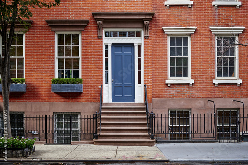 a beautiful brownstone apartment building