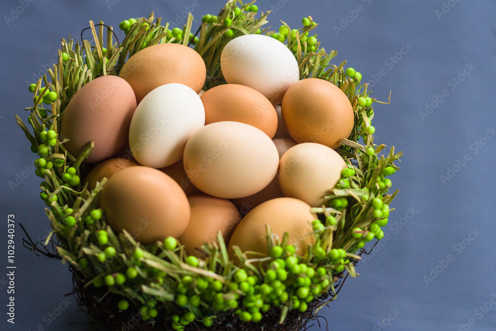 Eggs in the green basket close Eggs in the green basket close