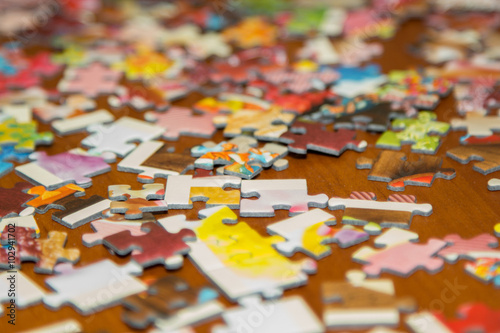 colorful jigsaw puzzle on the desk