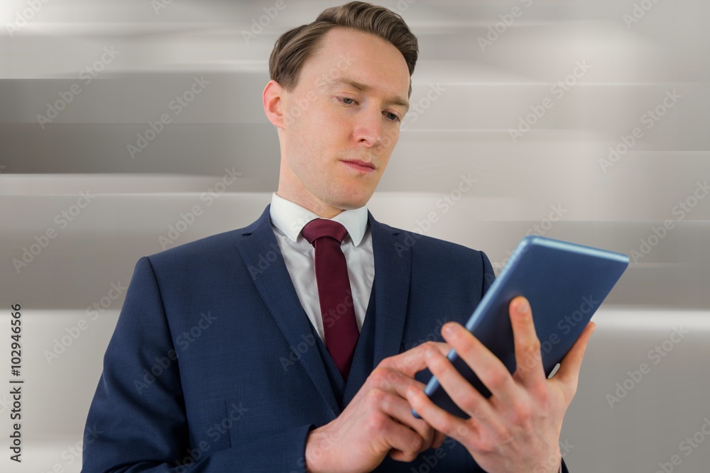 Composite image of businessman looking at his smartphone Composite image of businessman looking at his smartphone