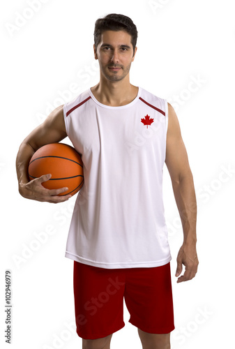 Professional Canadian basketball player with ball.