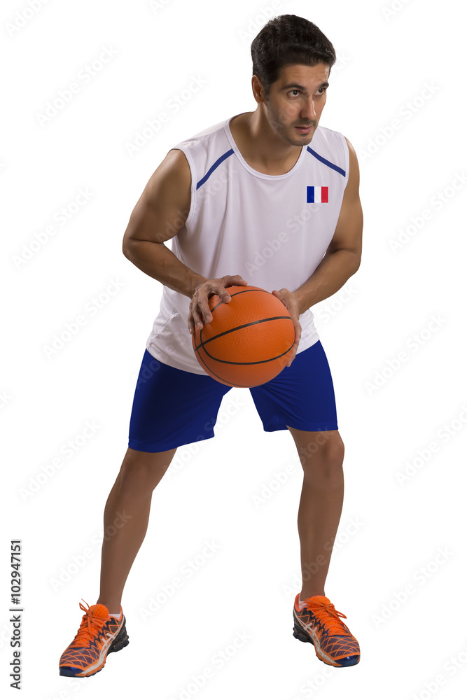 Professional French basketball player with ball.