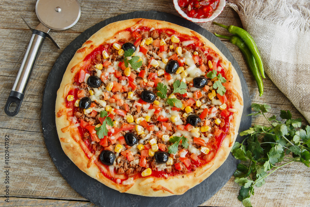 pizza with minced meat tomato cheese corn olives 