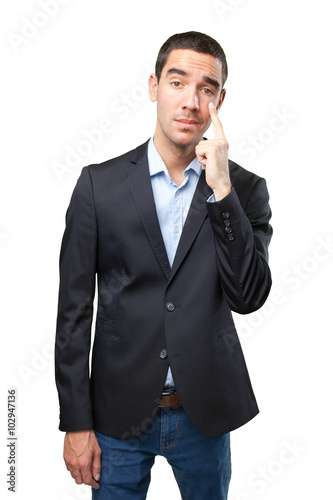 Worried businessman with observation gesture