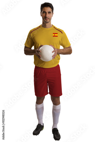 Spanish soccer player holding ball on white background